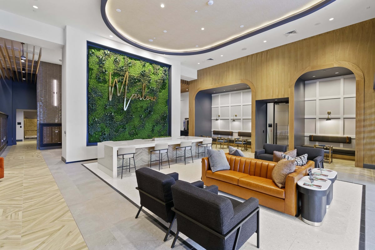 Relaxing lobby lounge with workspaces.