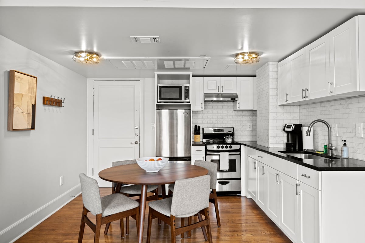 Fully-equipped kitchen and dining area.