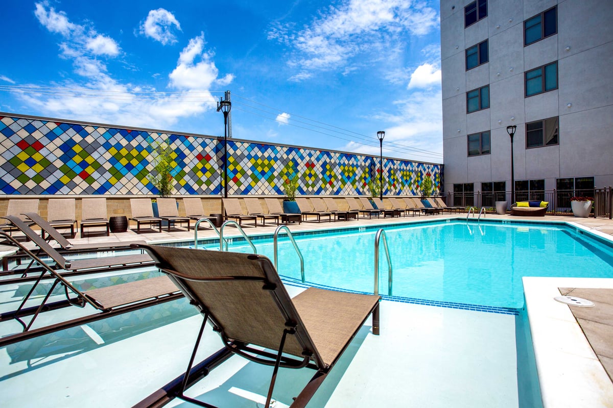 Pool with lounge chairs.