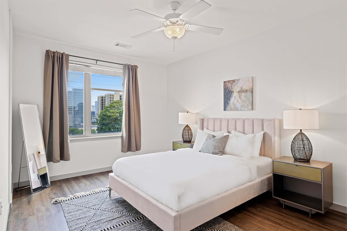 Separate bedroom with queen bed.