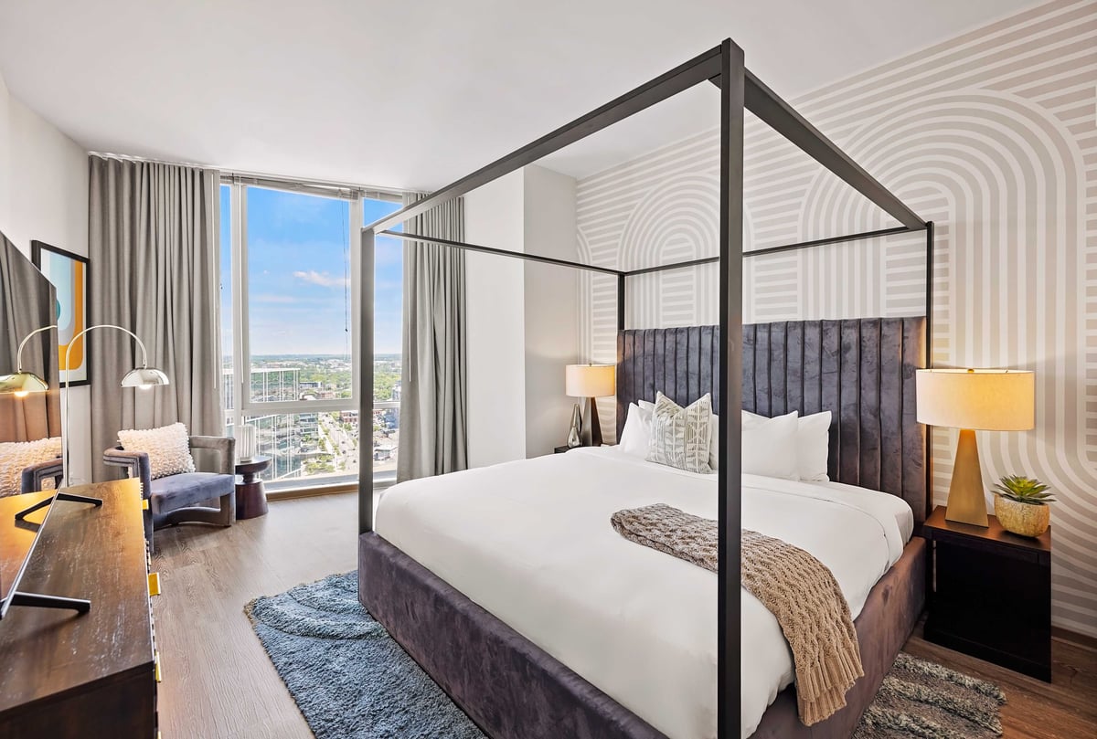Separate bedroom with queen bed.