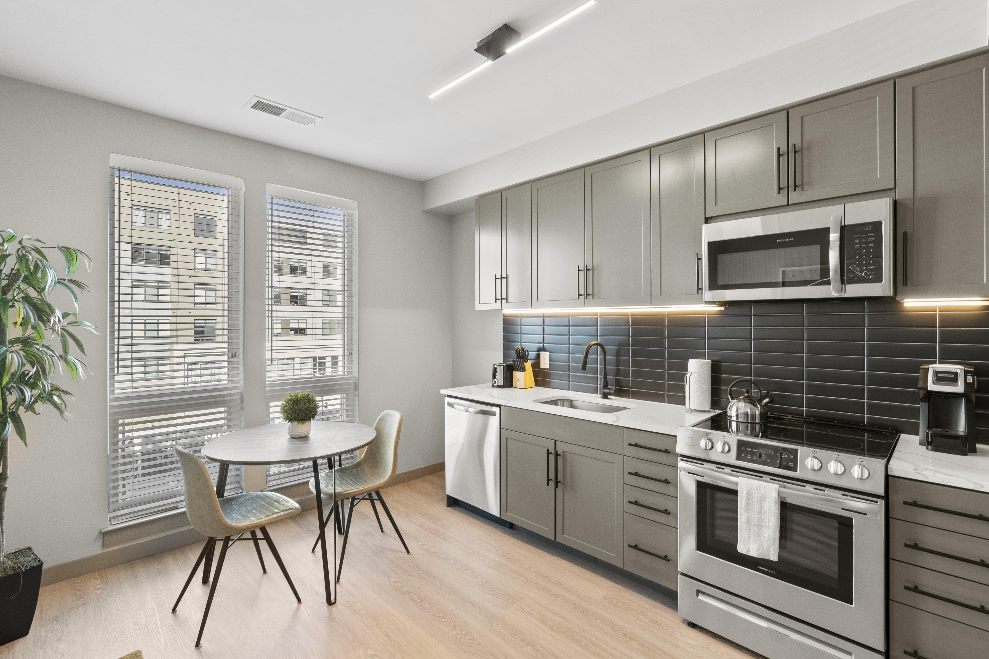 Dining area and fully-equipped kitchen. 