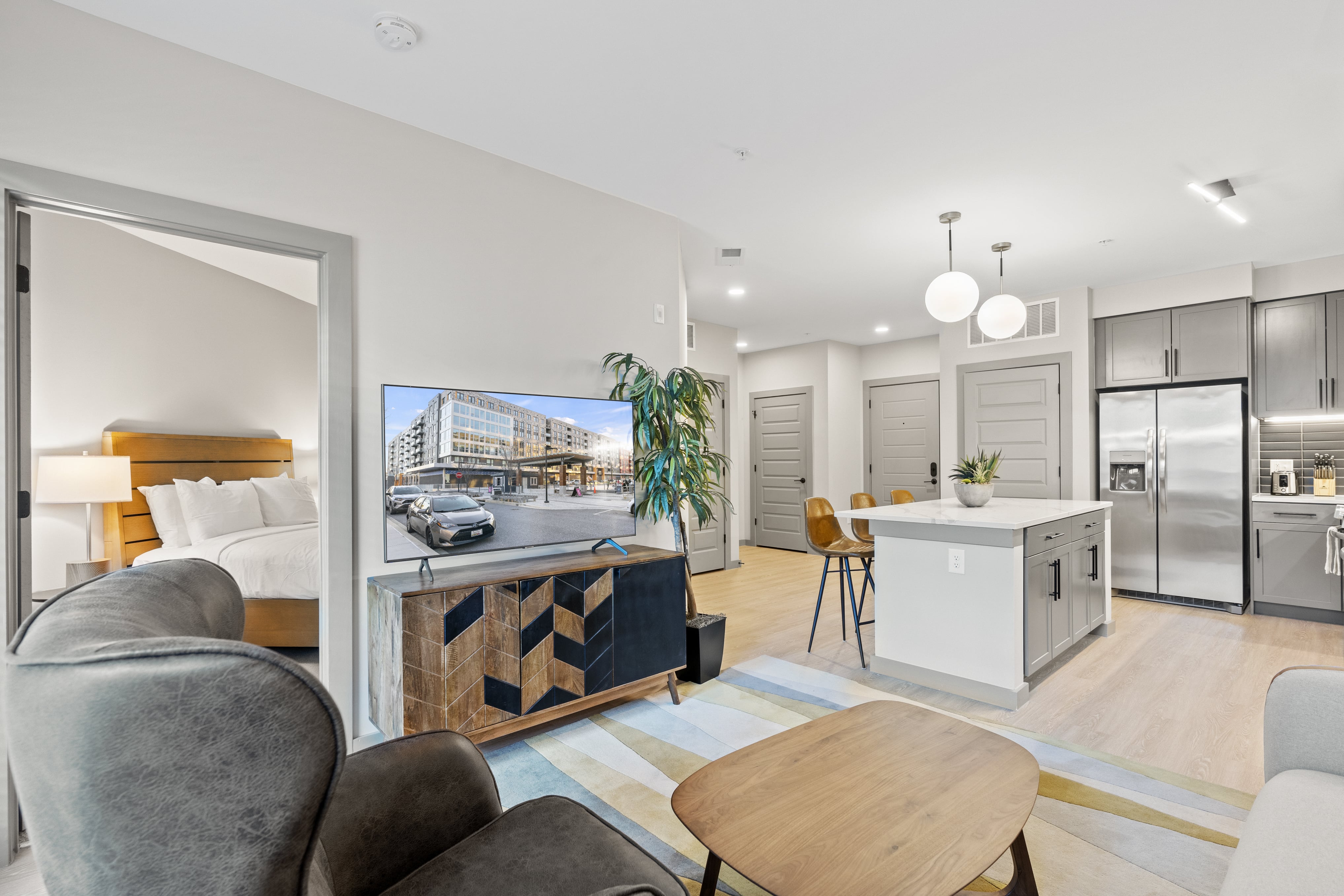 Living space with television and kitchen. 