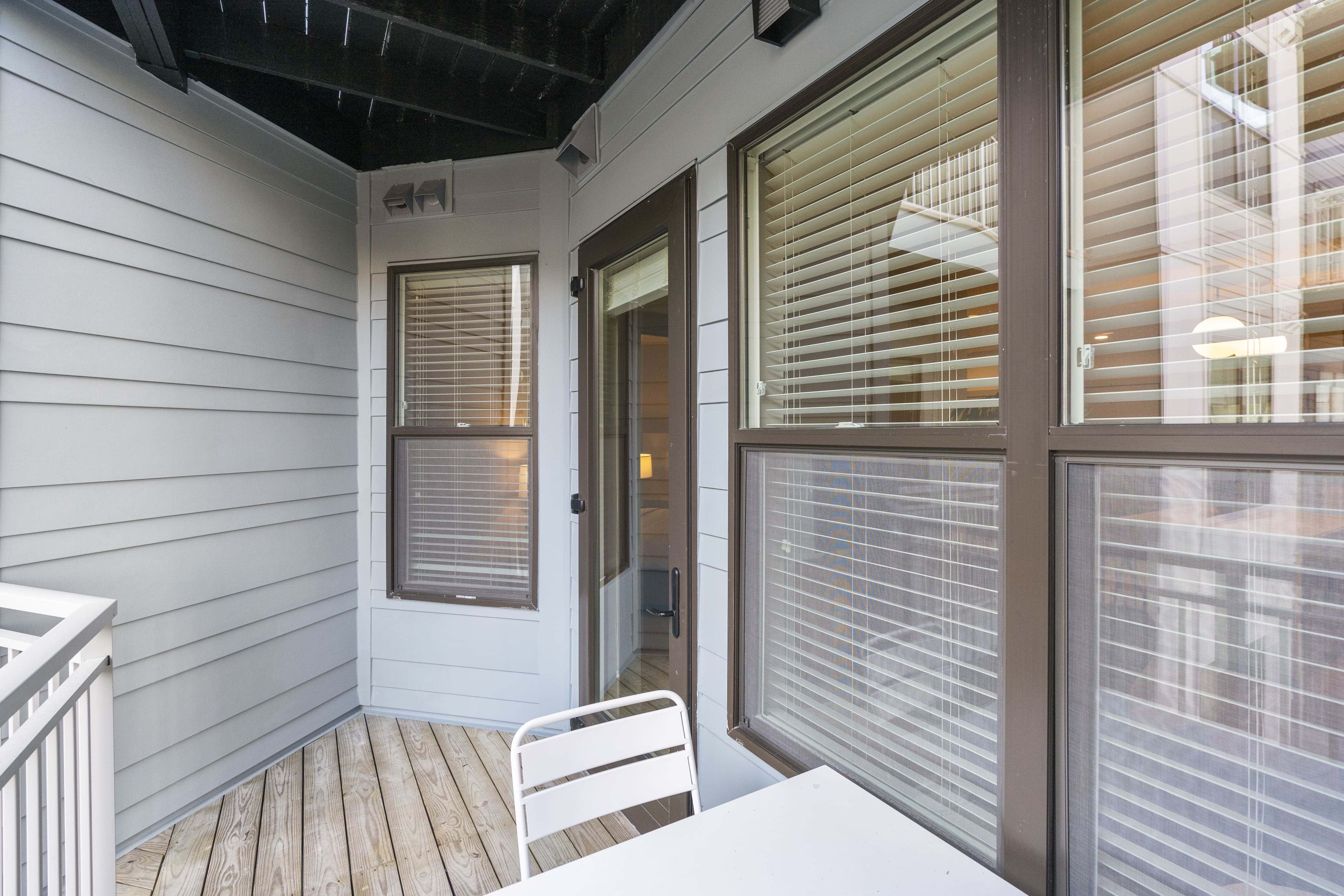 Balcony with outdoor seating. 