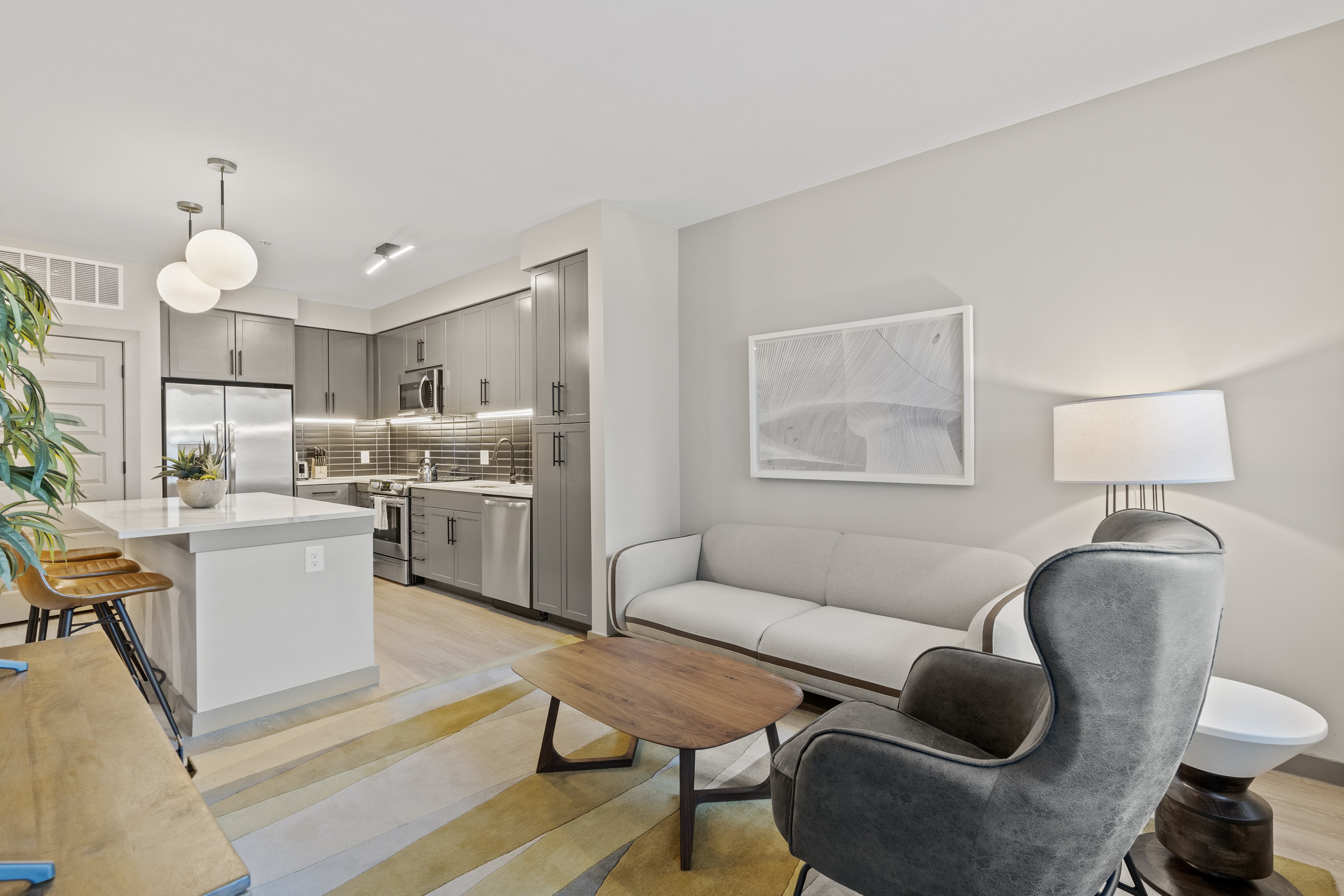 Living space and kitchen area. 