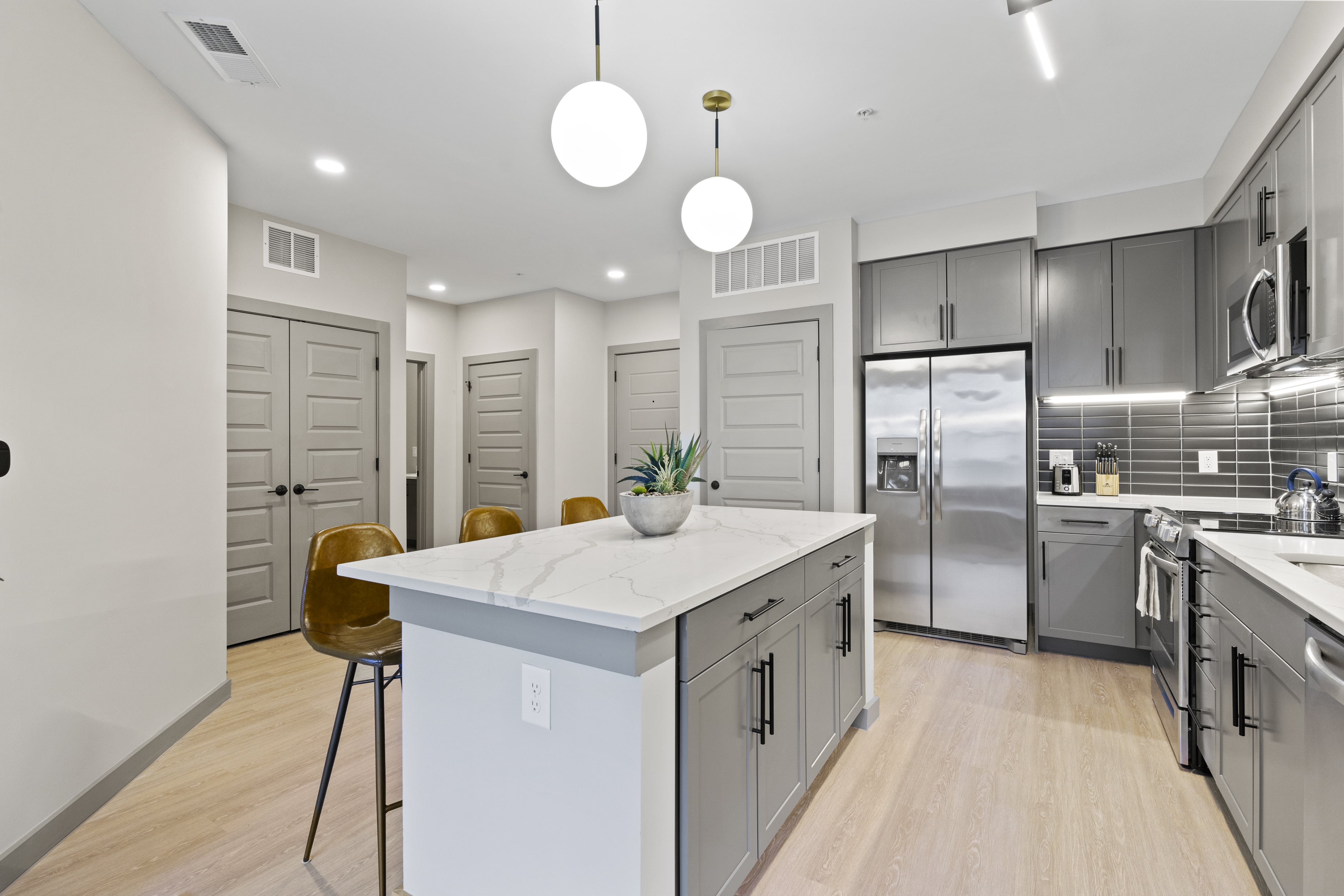 Fully-equipped kitchen with center island. 