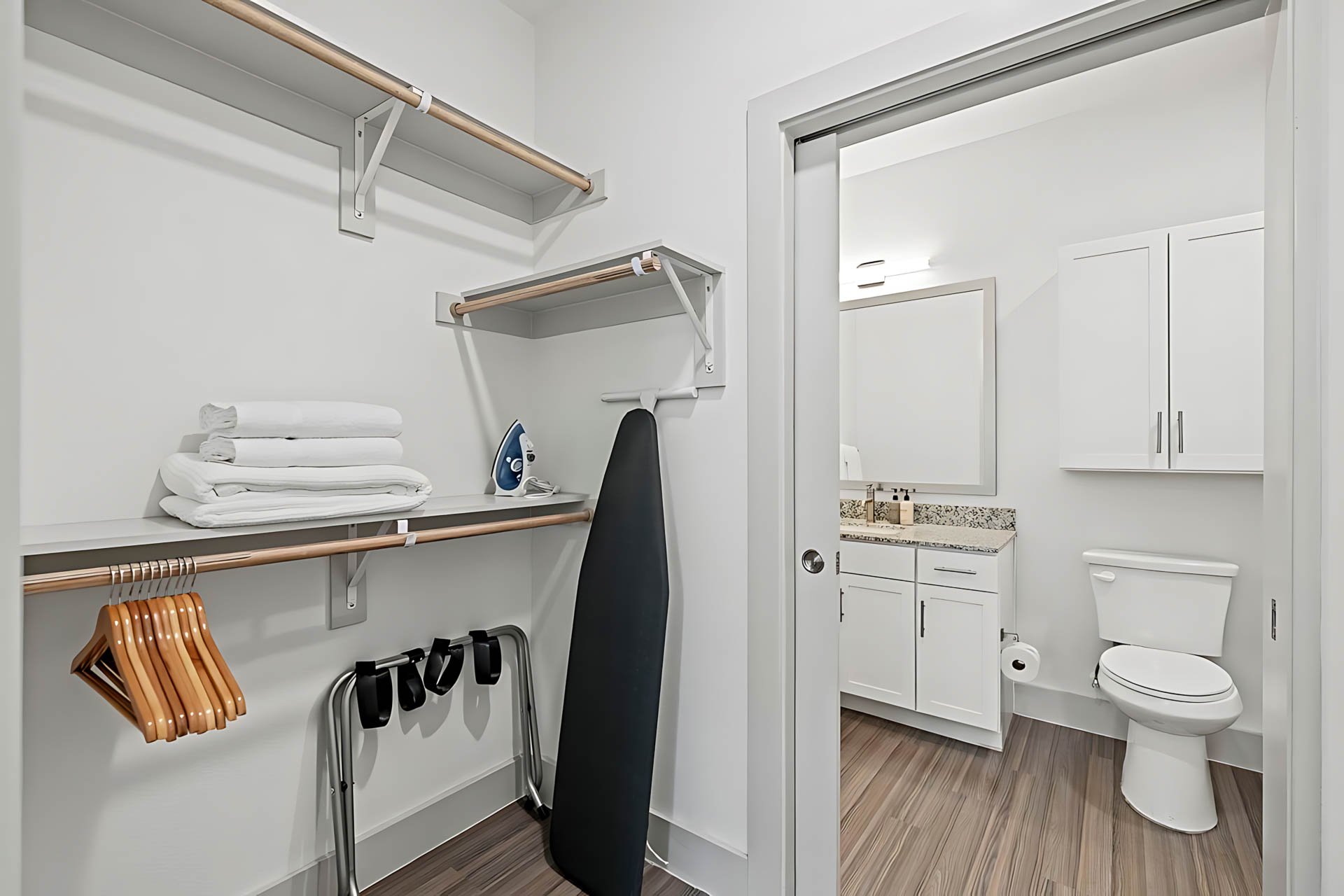 AUTX002_Guestroom_Premium Two Bedroom Apartment_Entry_Closet with ironing board