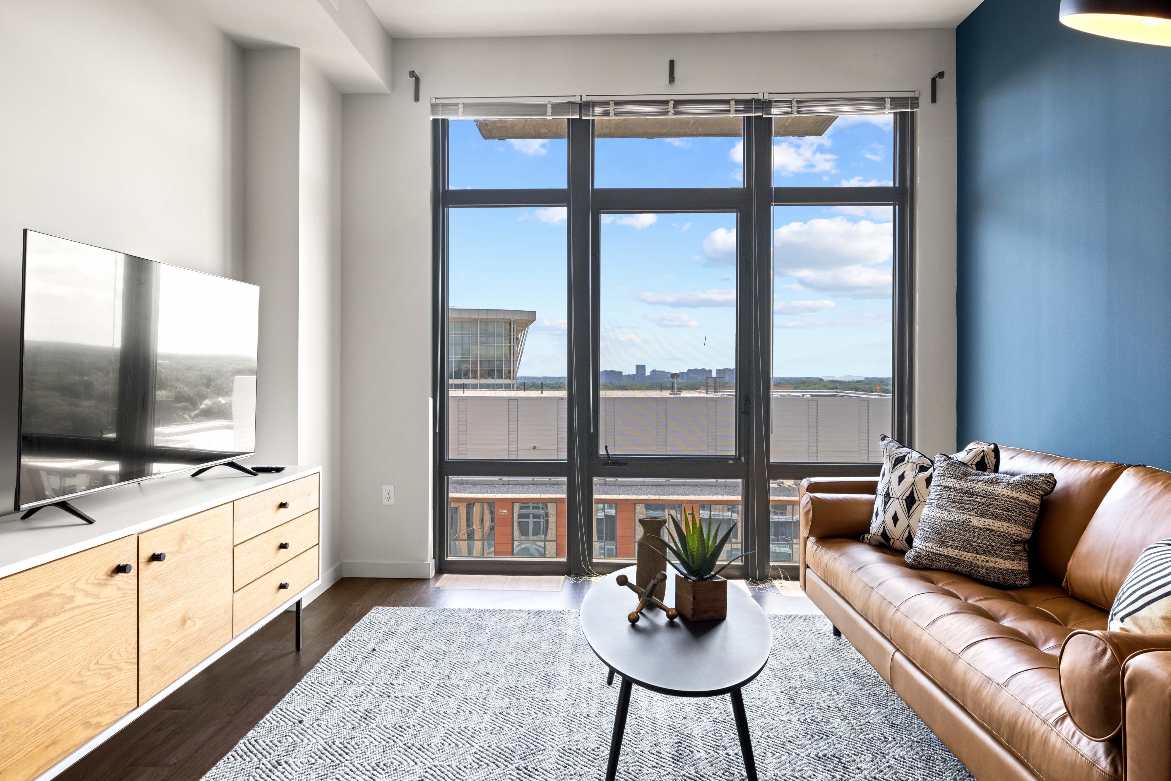 Hotel suite with floor to ceiling windows 