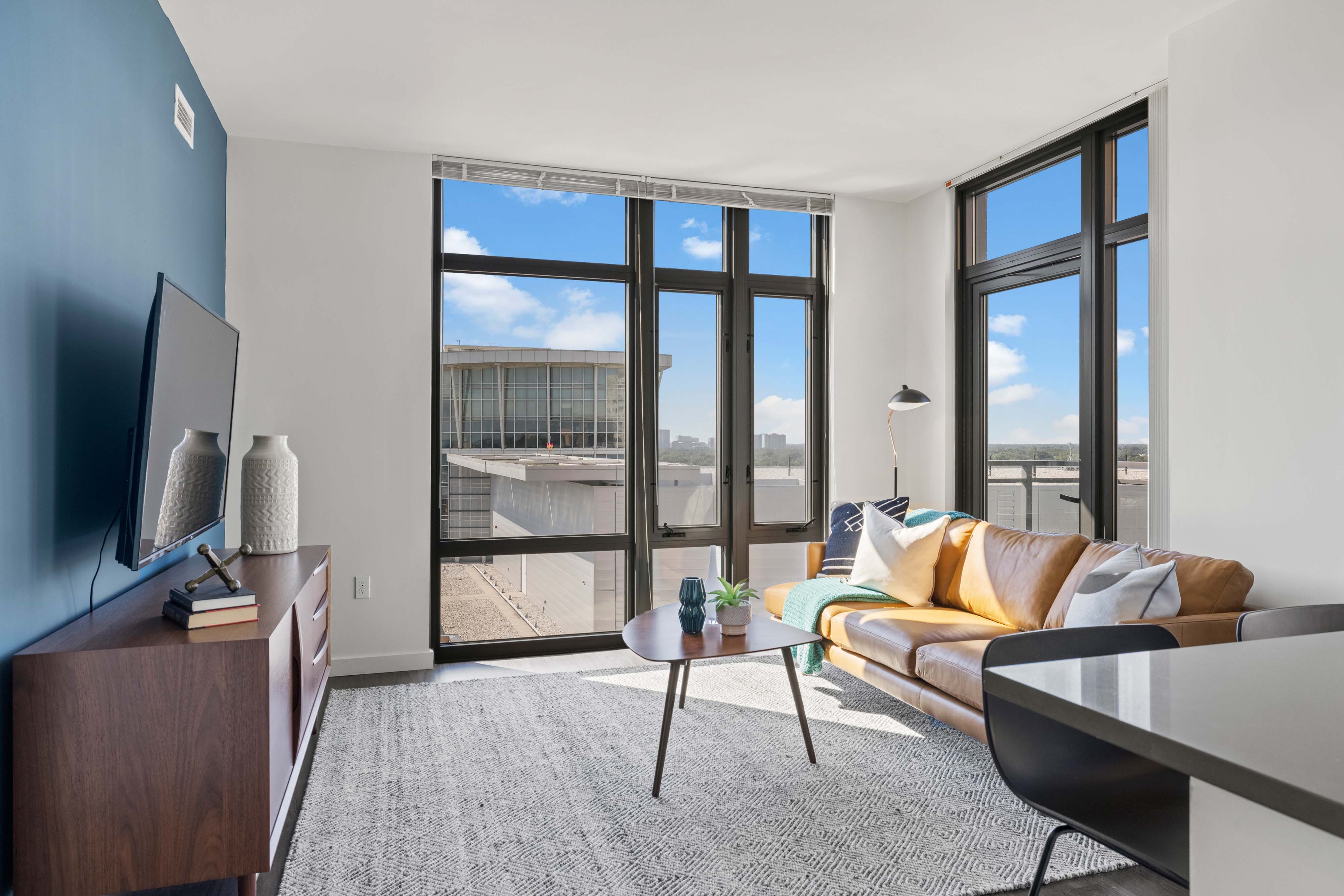 Corner hotel suite with expansive views of Arlington 