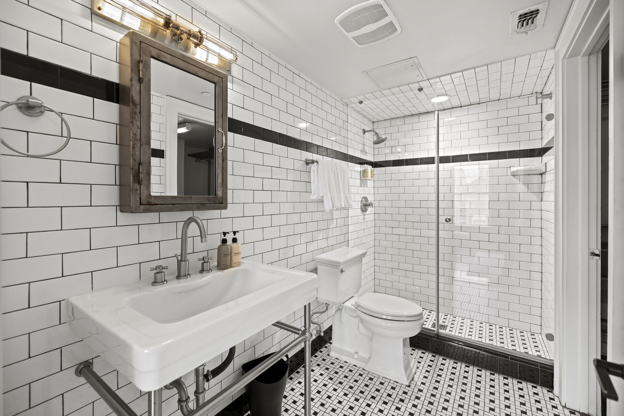 Modern bathroom with walk-in shower.