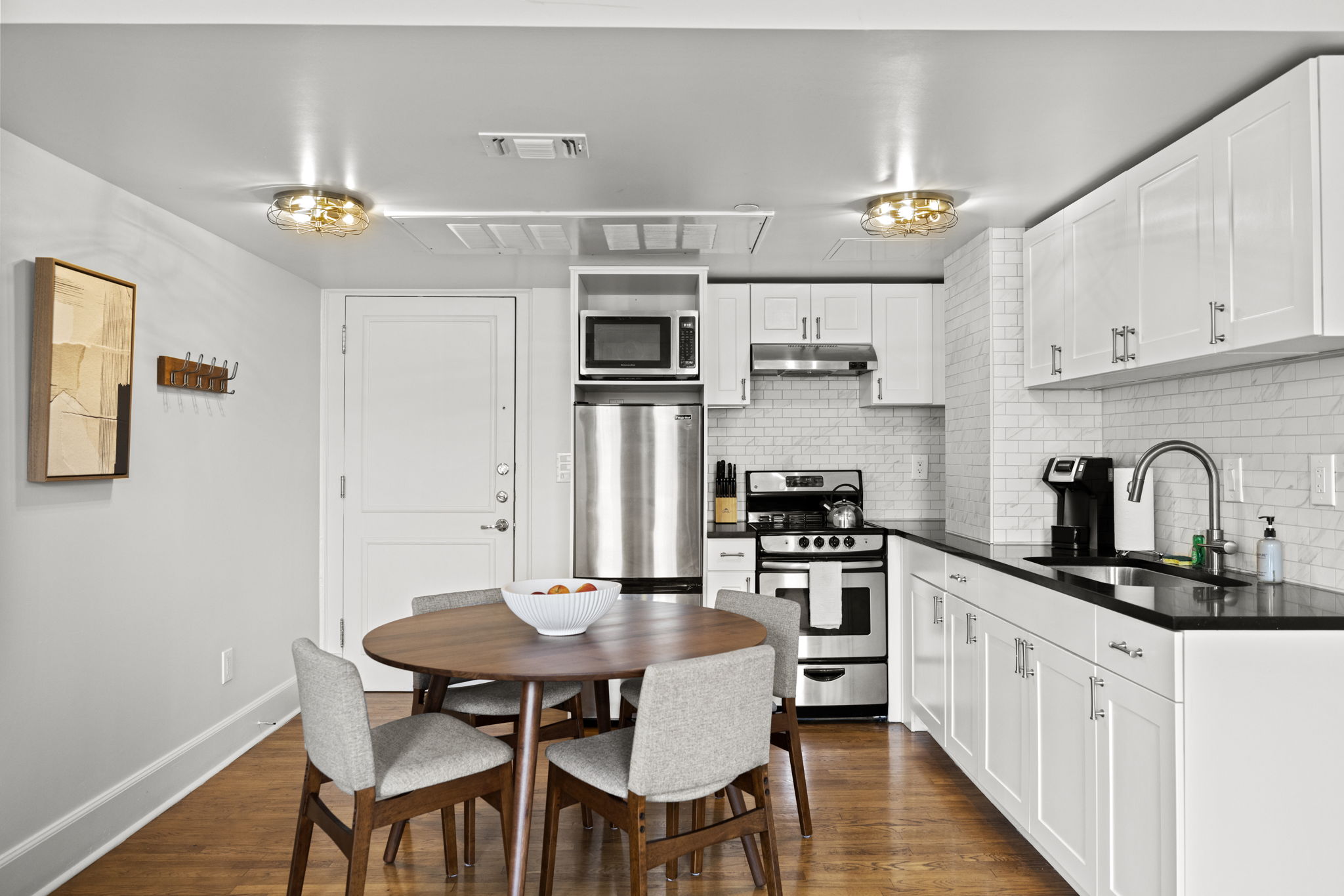 Fully-equipped kitchen with dining area.