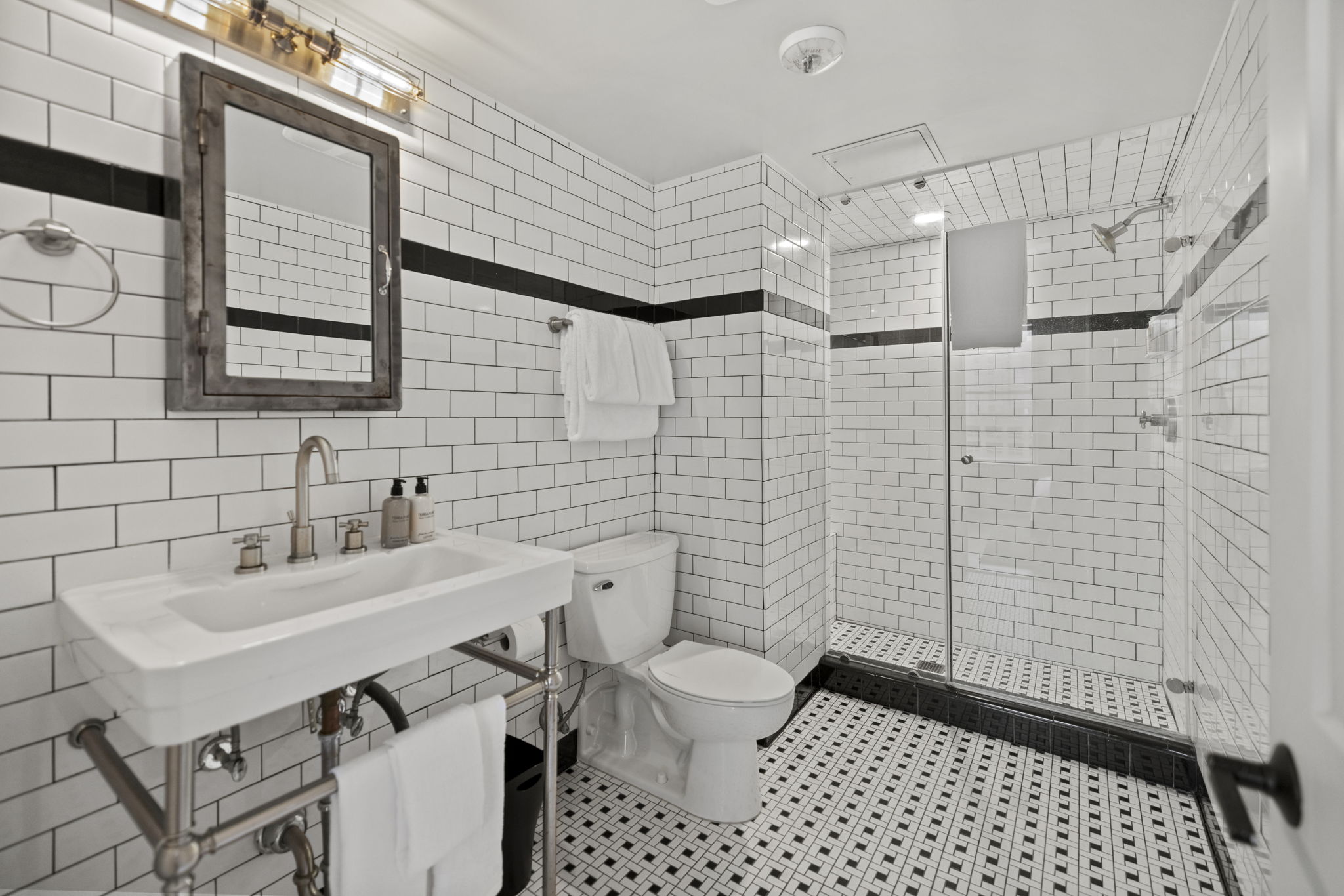 Modern bathroom with walk-in shower.