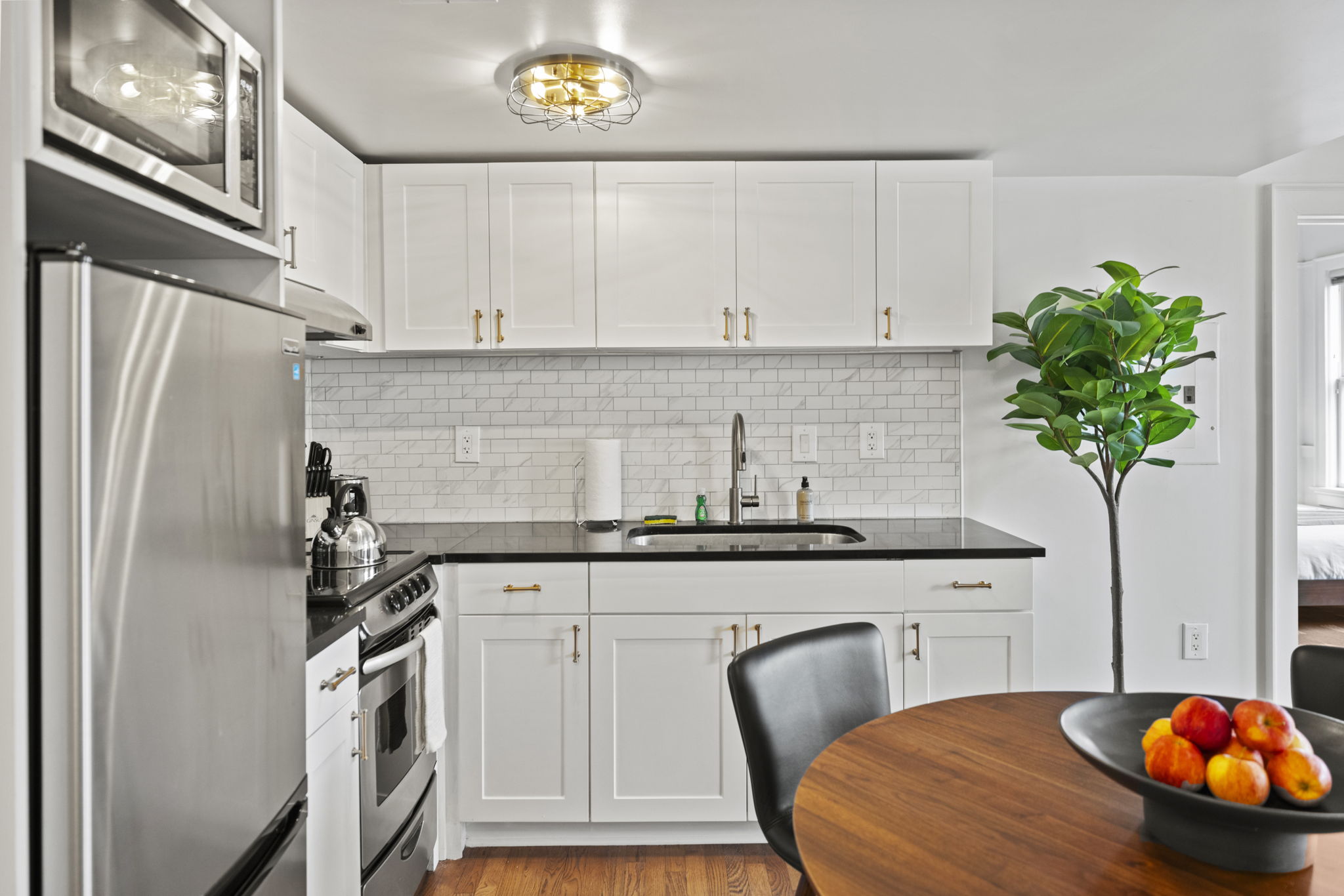 Fully-equipped kitchen with dining area.