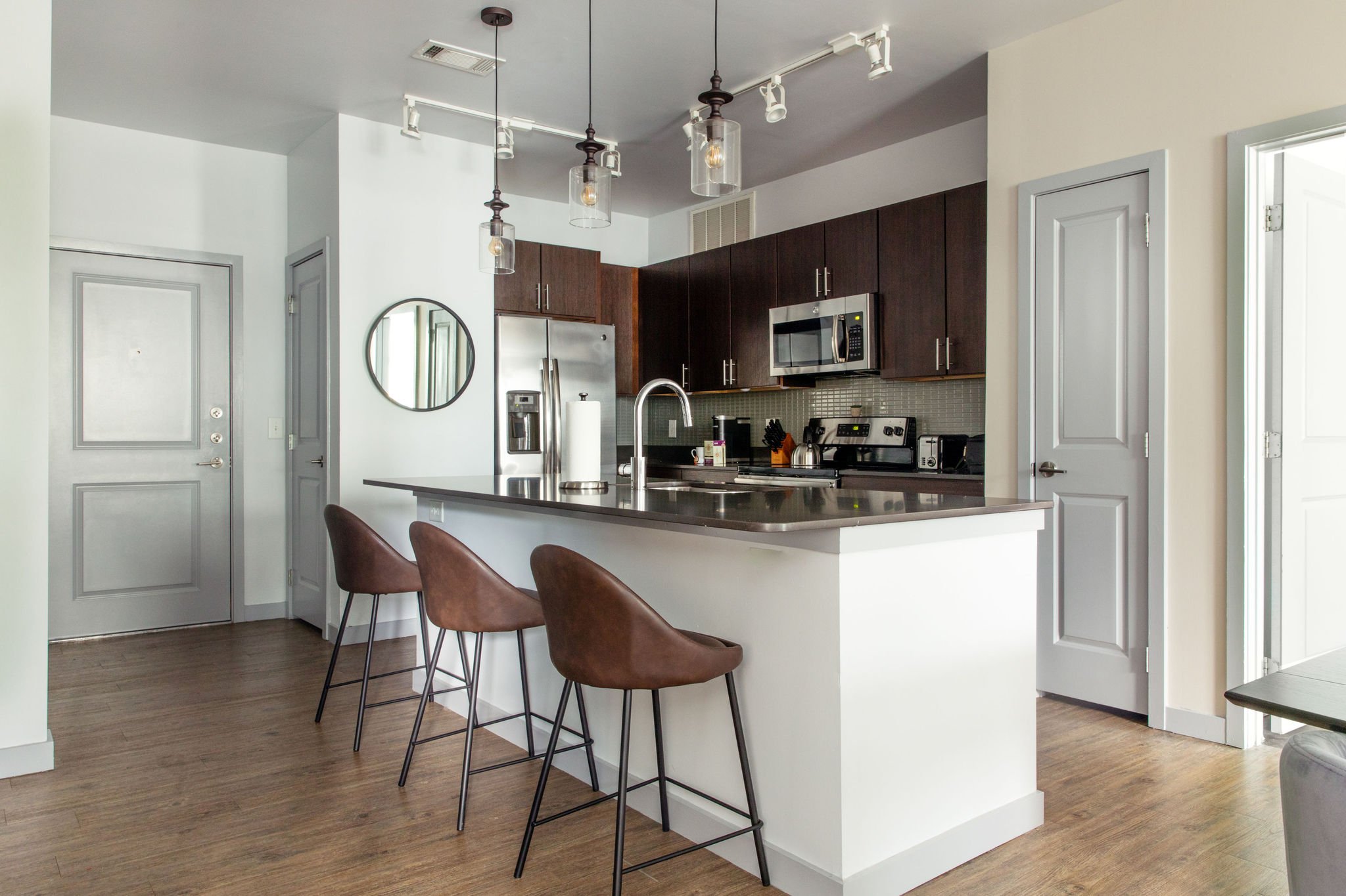 Full kitchen with breakfast bar.