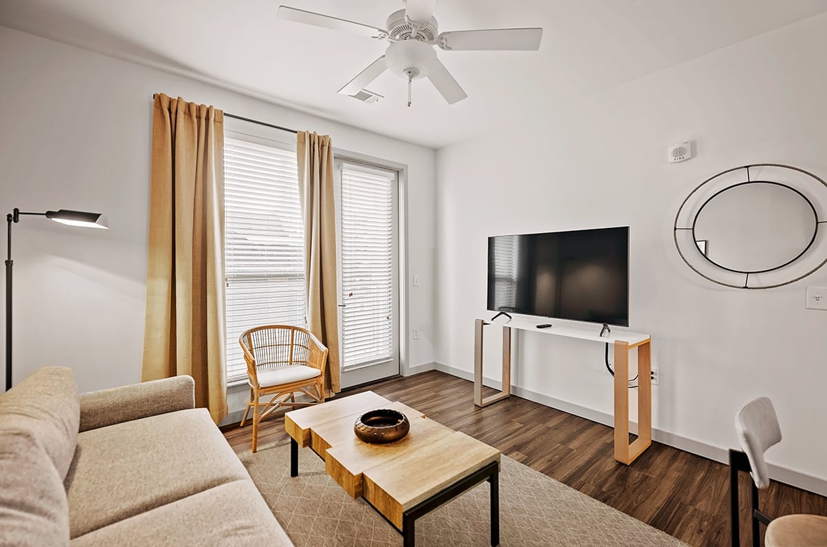 Living room with couch and television.