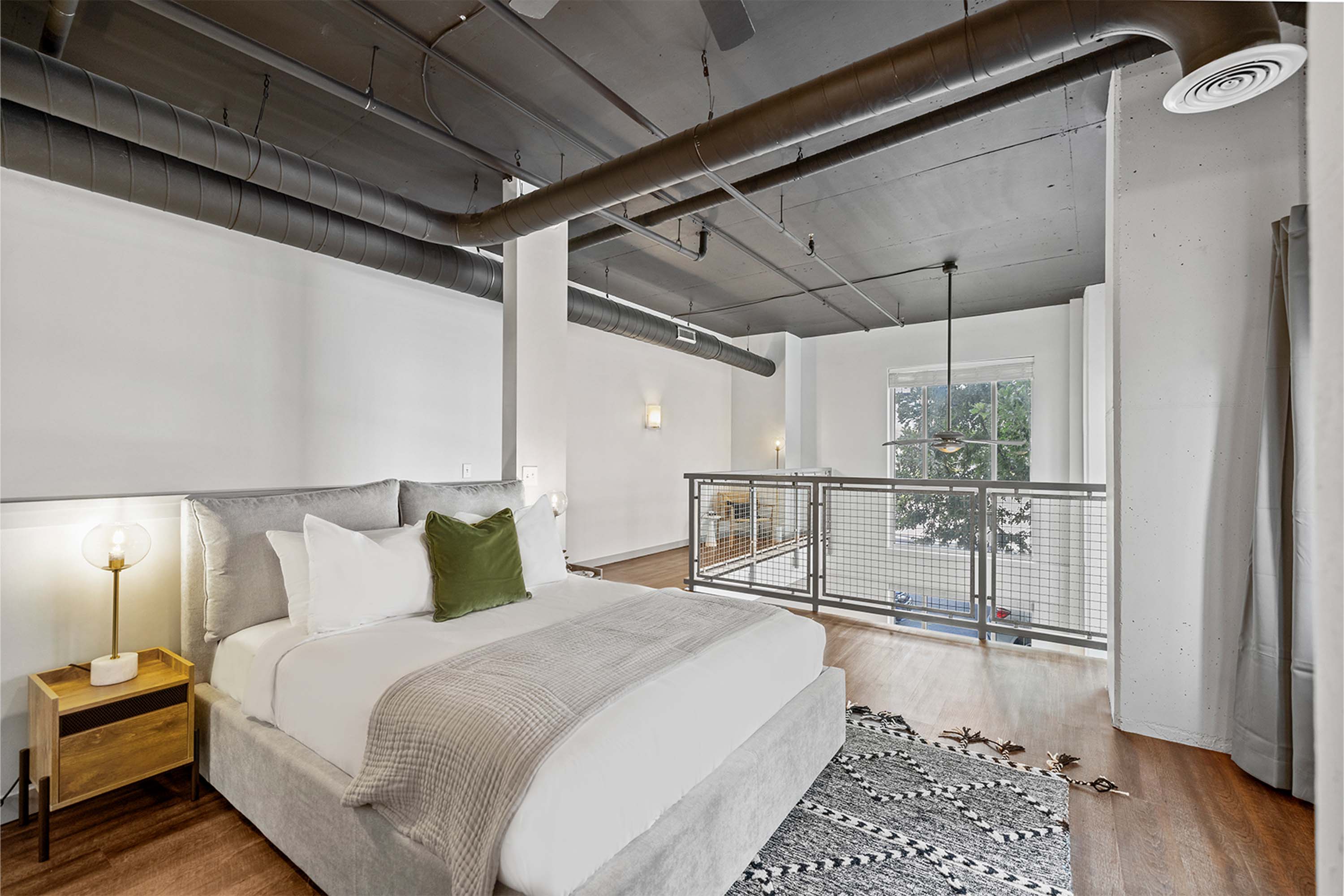 Queen bed in loft space.