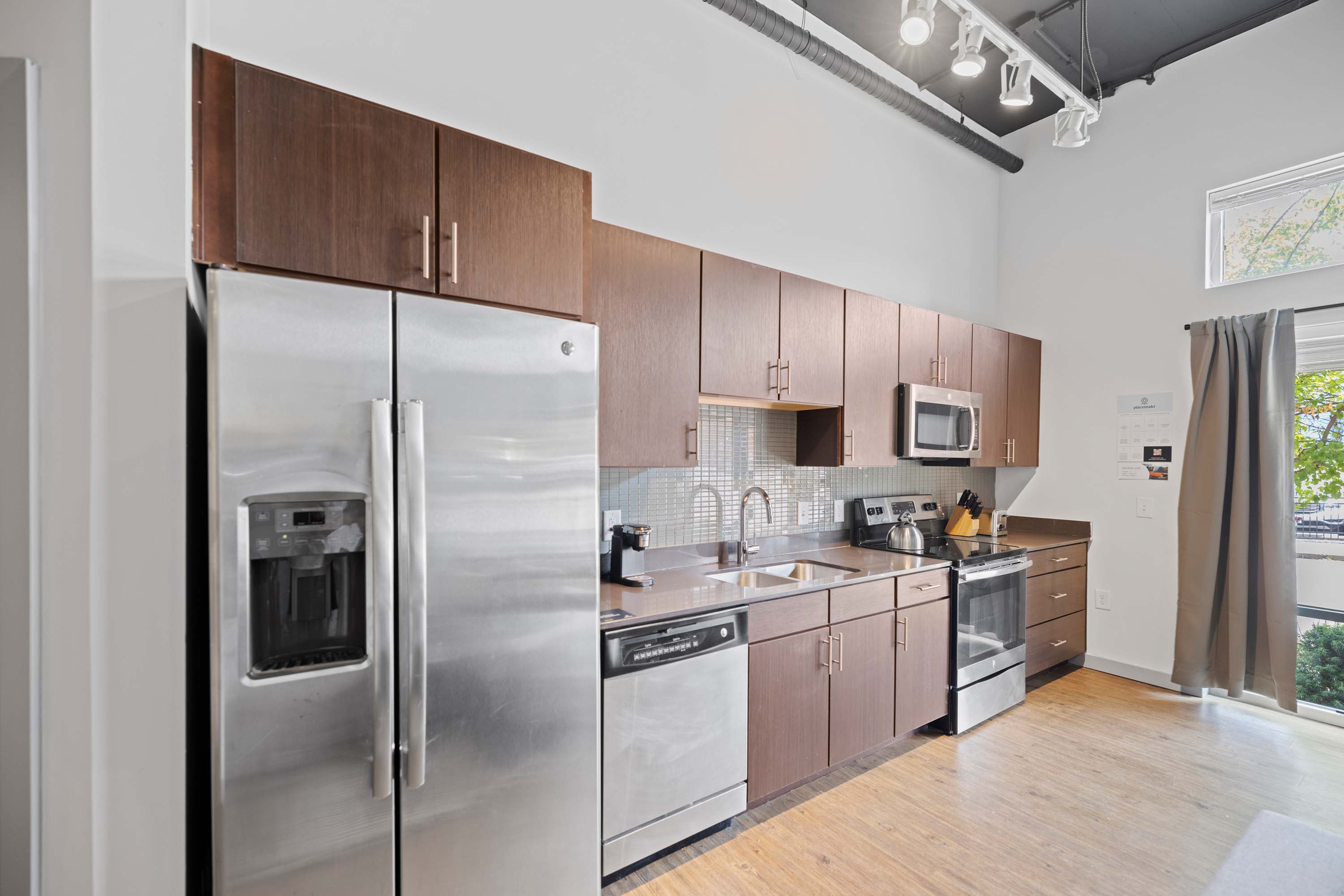 Full-equipped kitchen with full size appliances.