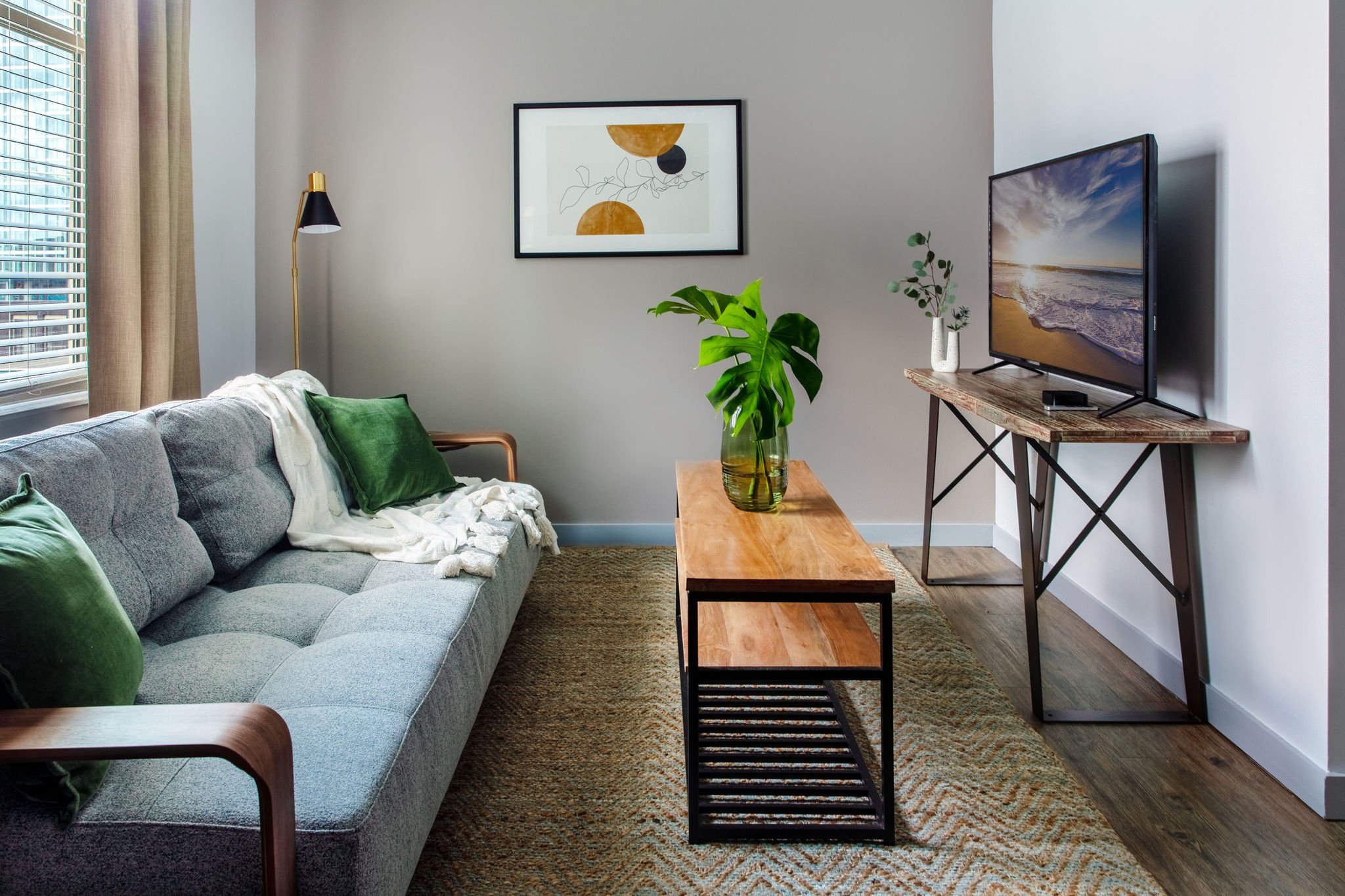 Living area with couch and television.