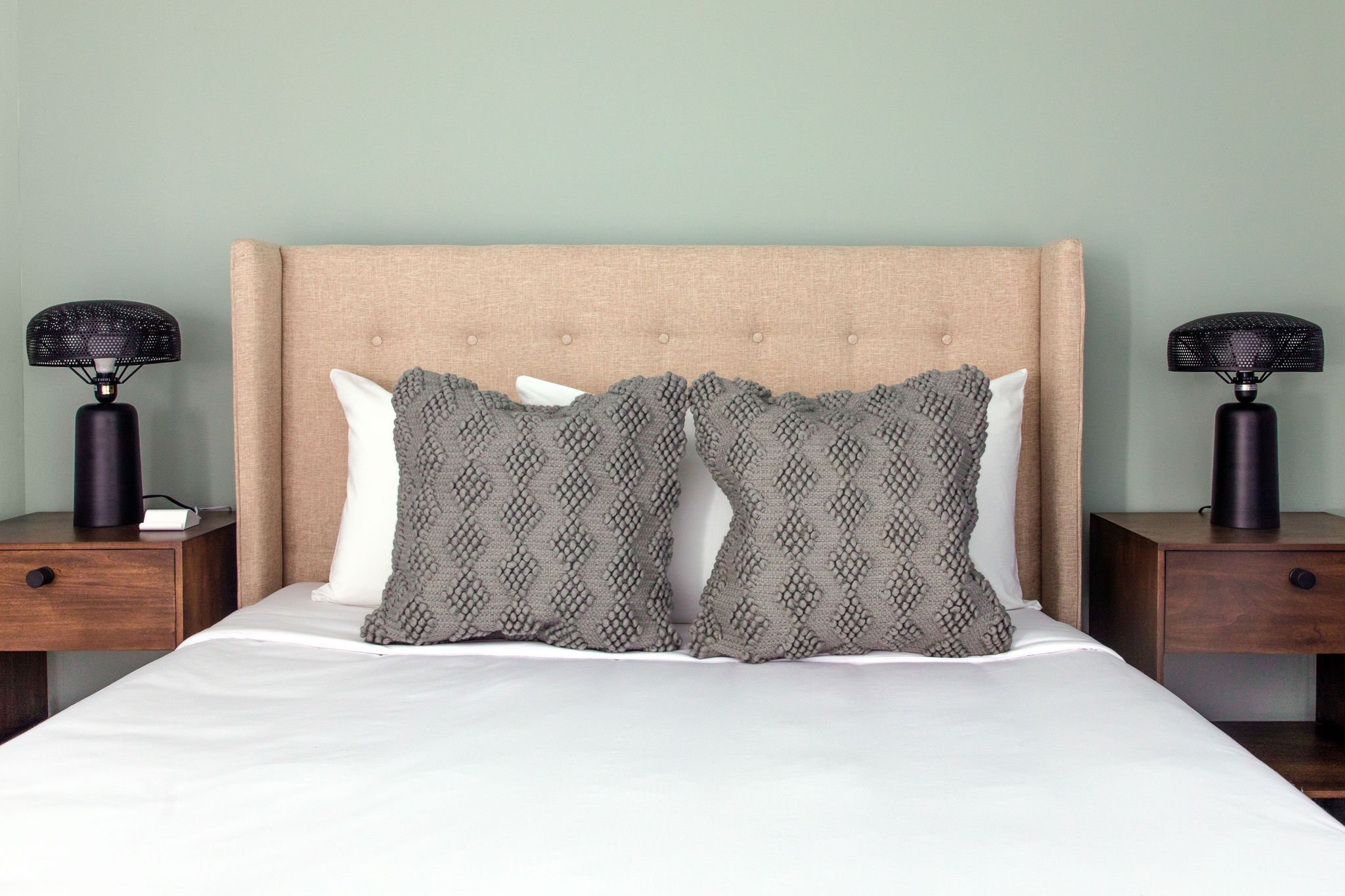 Queen bed with double nightstands.