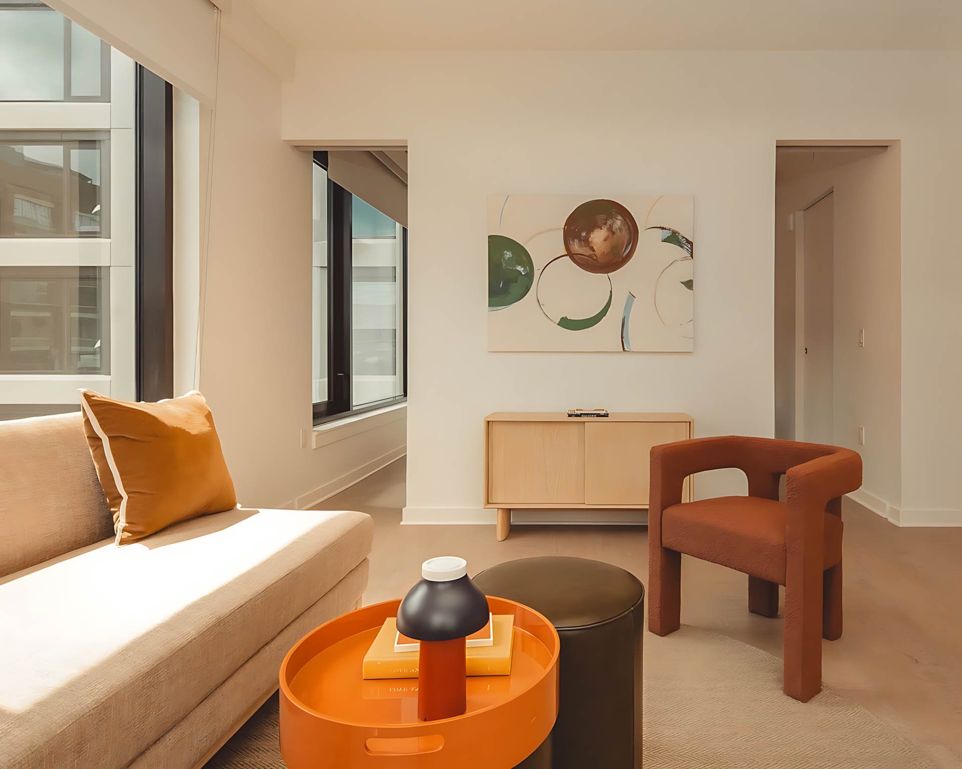 ATGA001_Guestroom_Premium Two Bedroom_Lounge Area_Beige sofa orange table