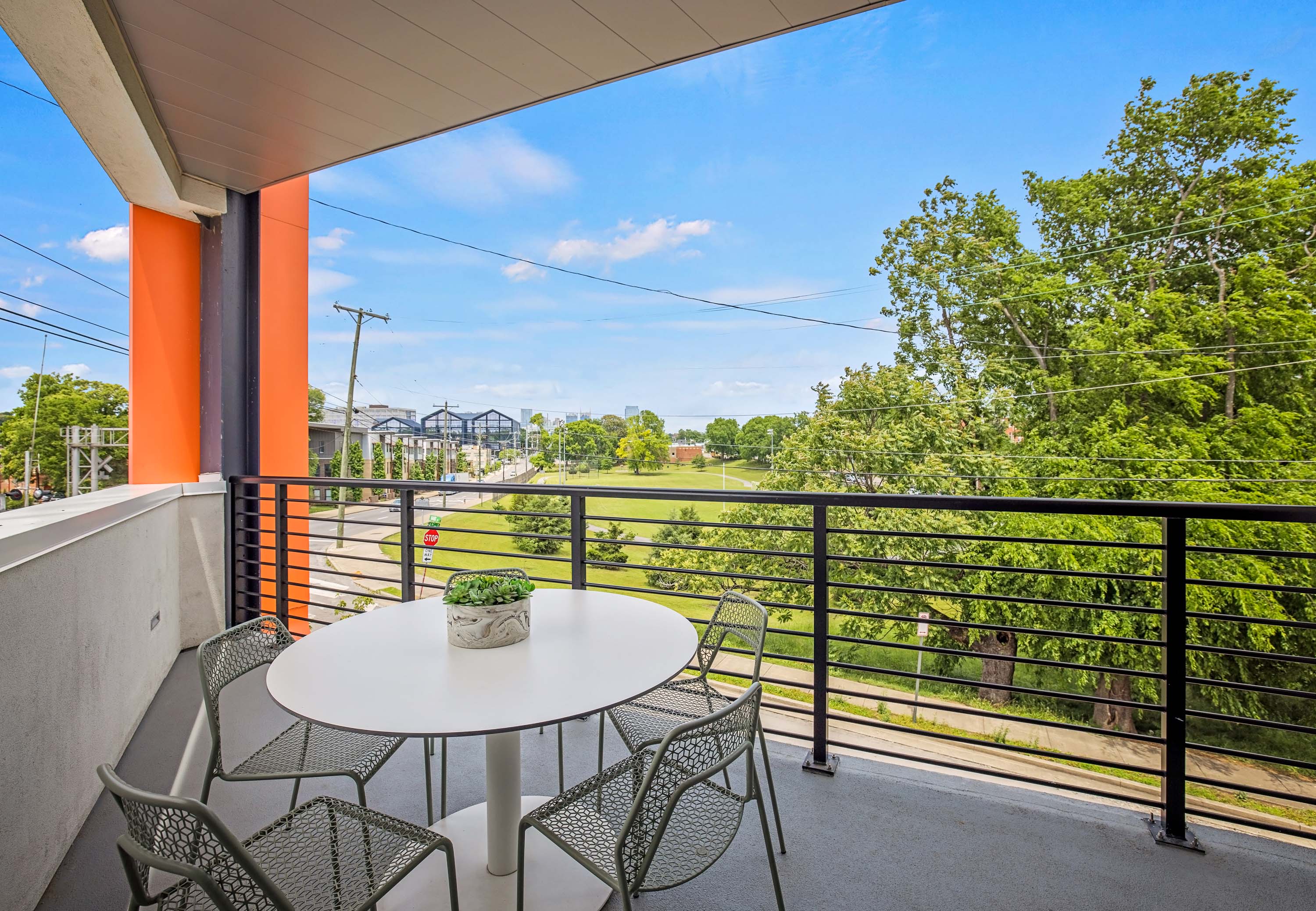 Balcony with outdoor seating. 