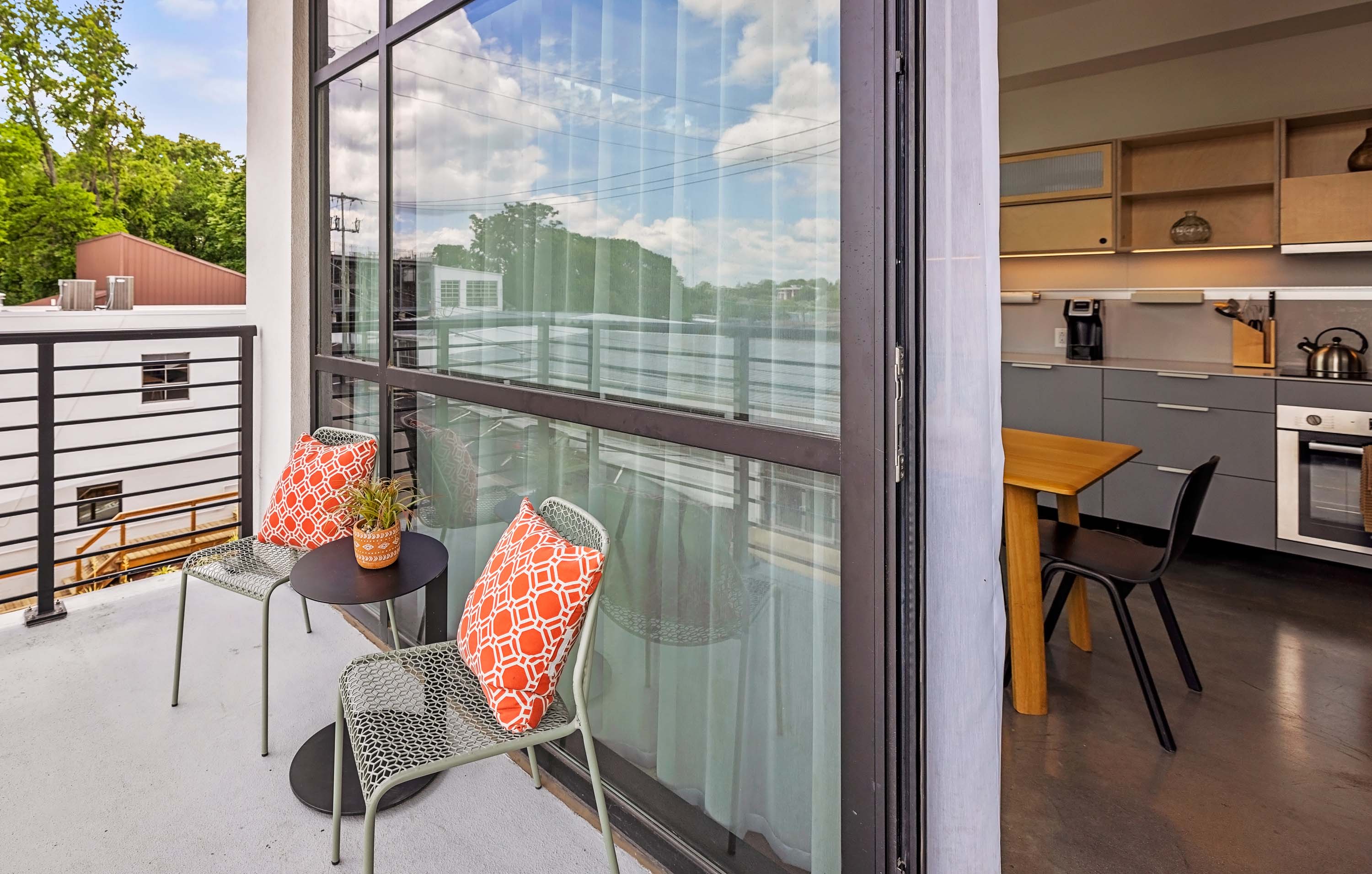 Balcony with outdoor seating.