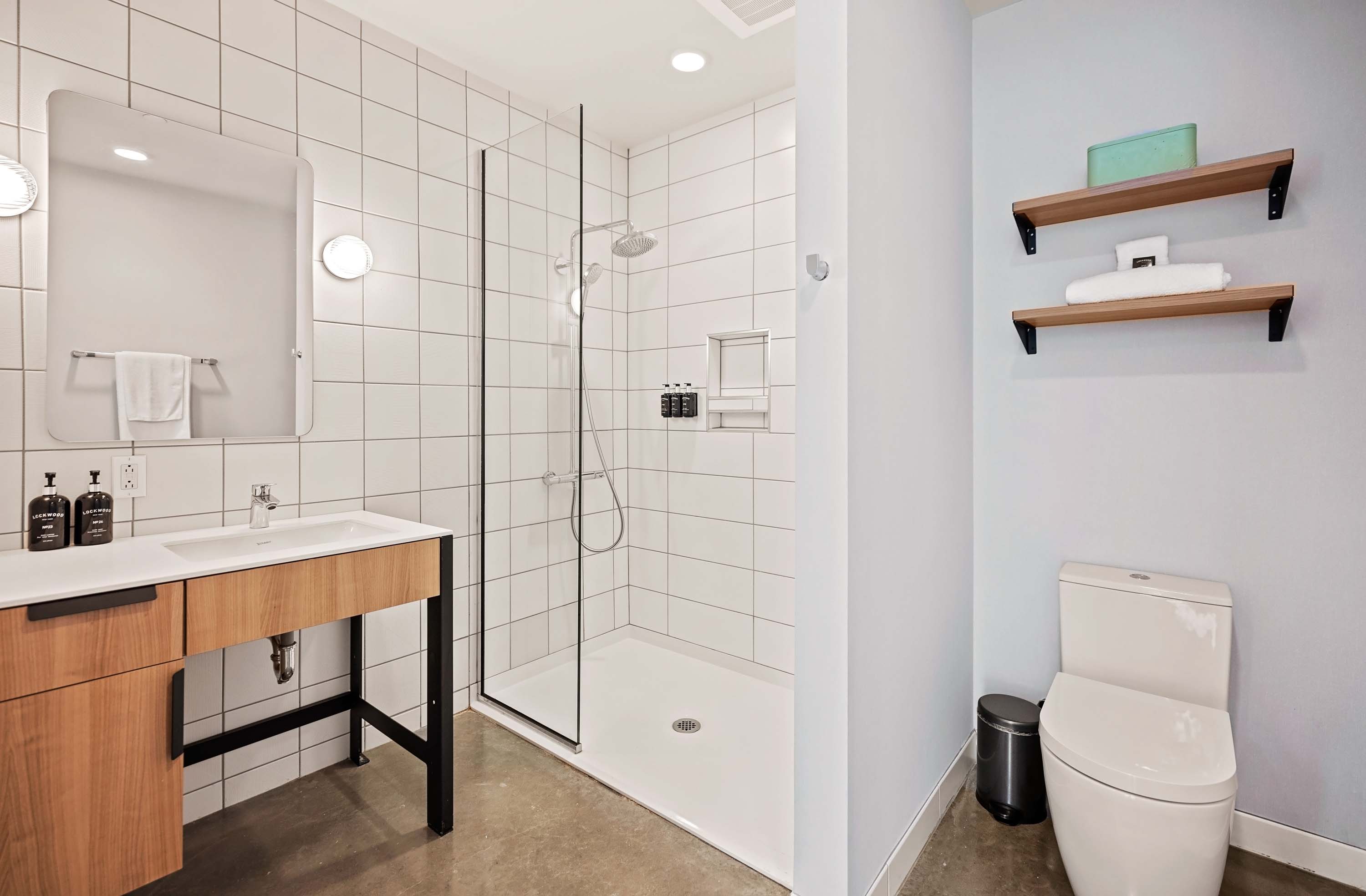 Bathroom with walk-in shower.