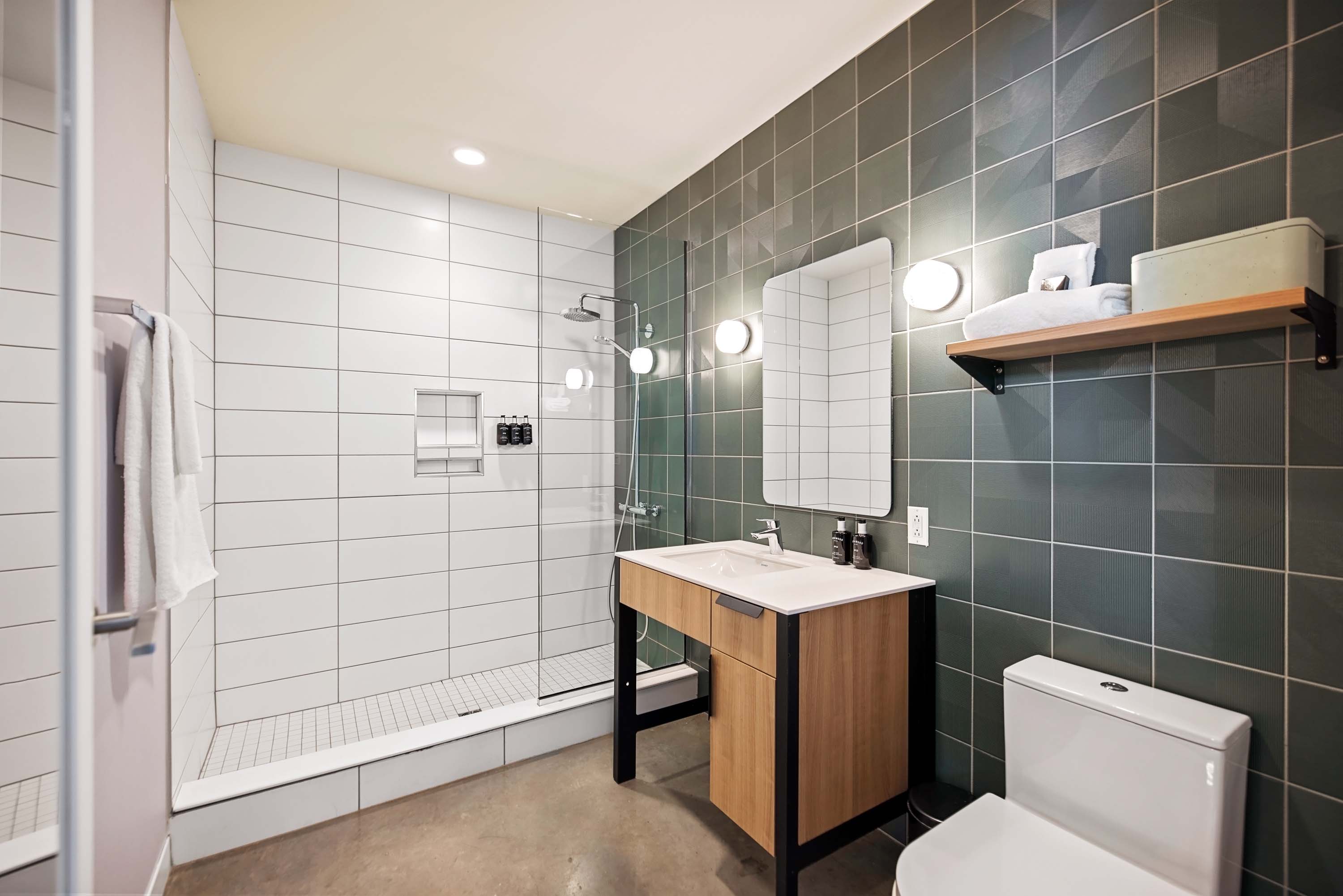 Modern bathroom with walk-in shower.