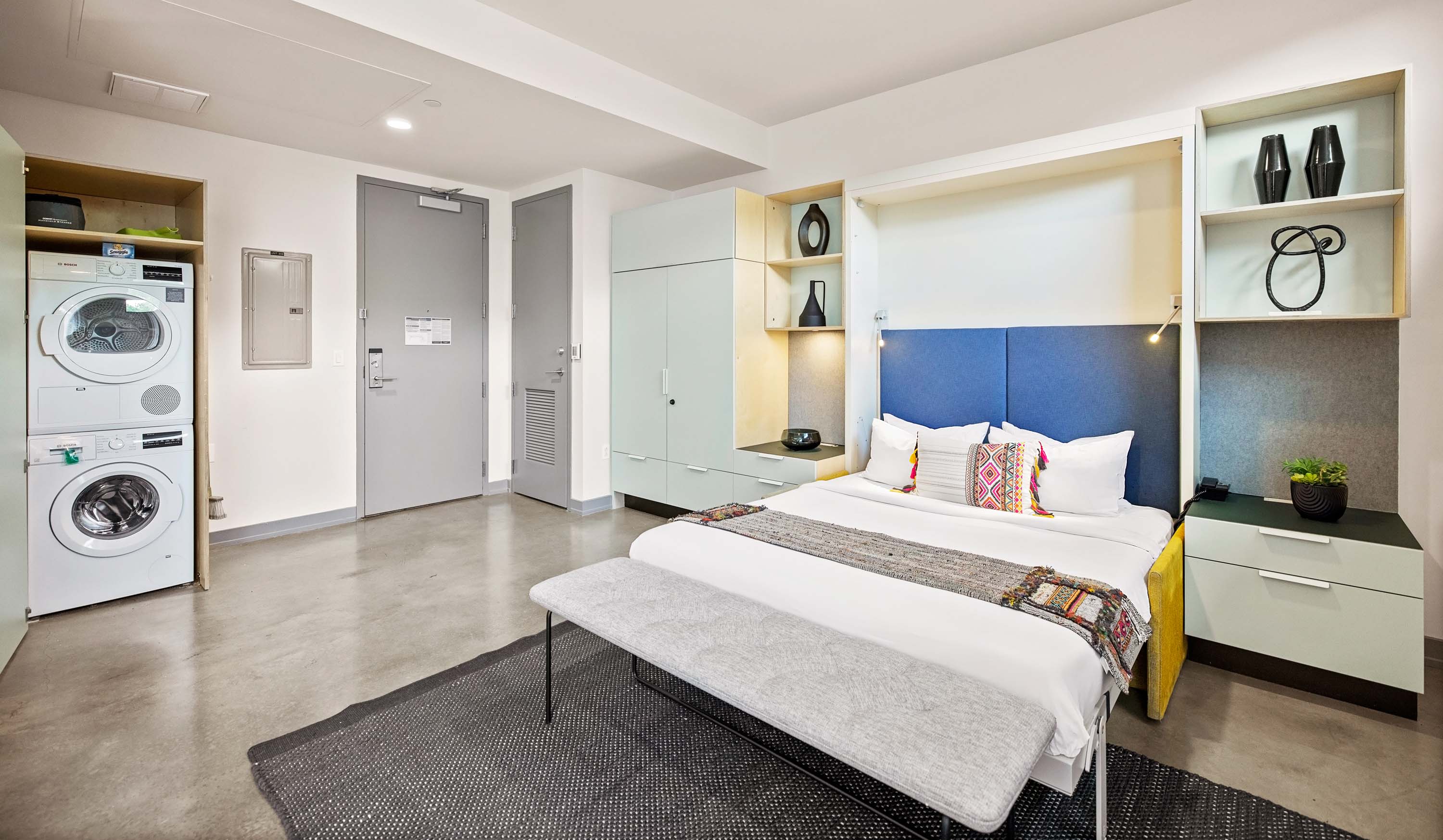 Queen-sized murphy bed with in-unit laundry. 